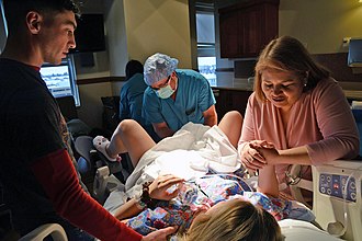 330px-Surrogate_parents_attending_birth.jpg