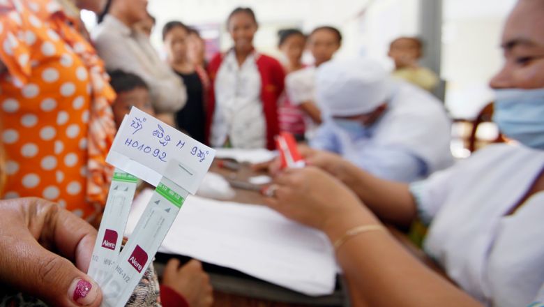 topic-1-villagers-pass-hiv-to-roka-health-center-at-roka-villageroka-communesang.jpg