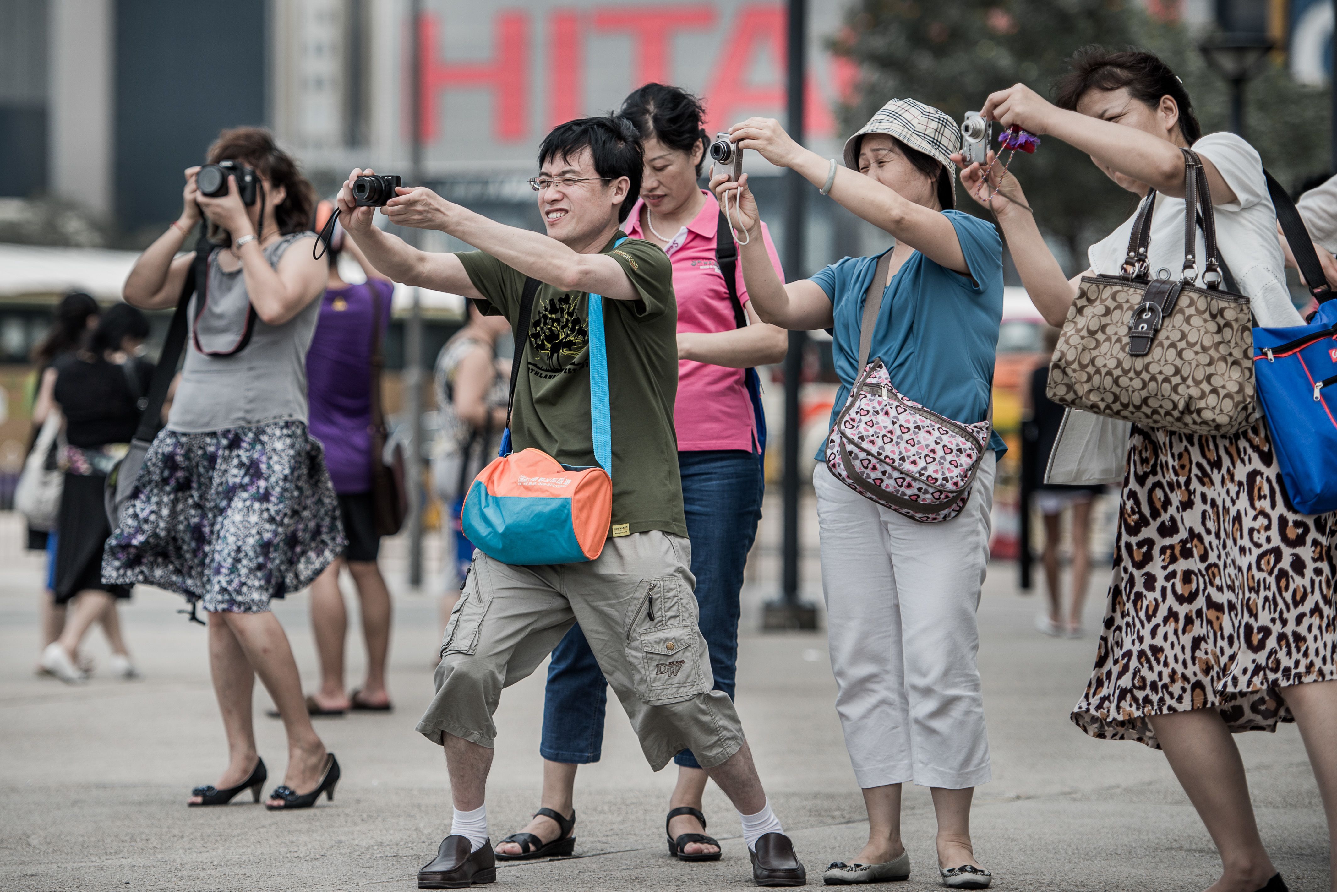 130517141050-china-tourists-hong-kong-camera.jpeg