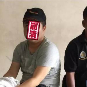 一中国籍男子因盗窃ATM机被捕