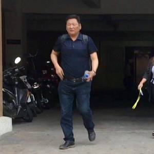在暹粒机场被扣‧韩商被押送法院